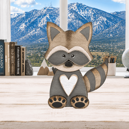 Layered Raccoon Shelf Sitter